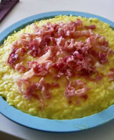 foto ricetta Crostata di riso allo zafferano con riccioli di pancetta 