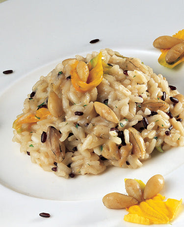 foto ricetta Riso venere alle rane disossate e fiori di zucca 