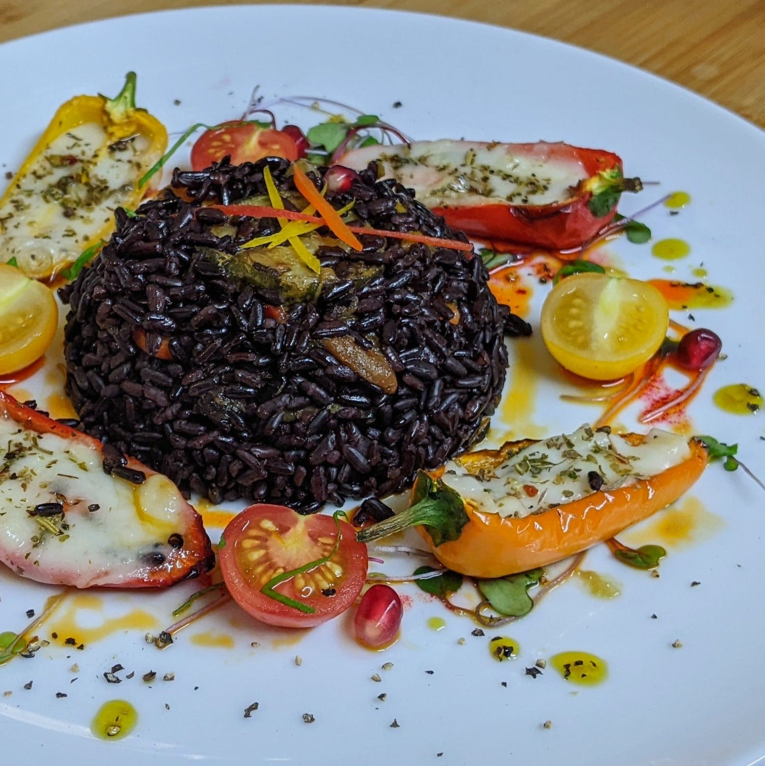 ITALIAN HERB ROASTED VEGETABLES, BLACK RICE AND VEGAN FETA STUFFED MINI PEPPERS 